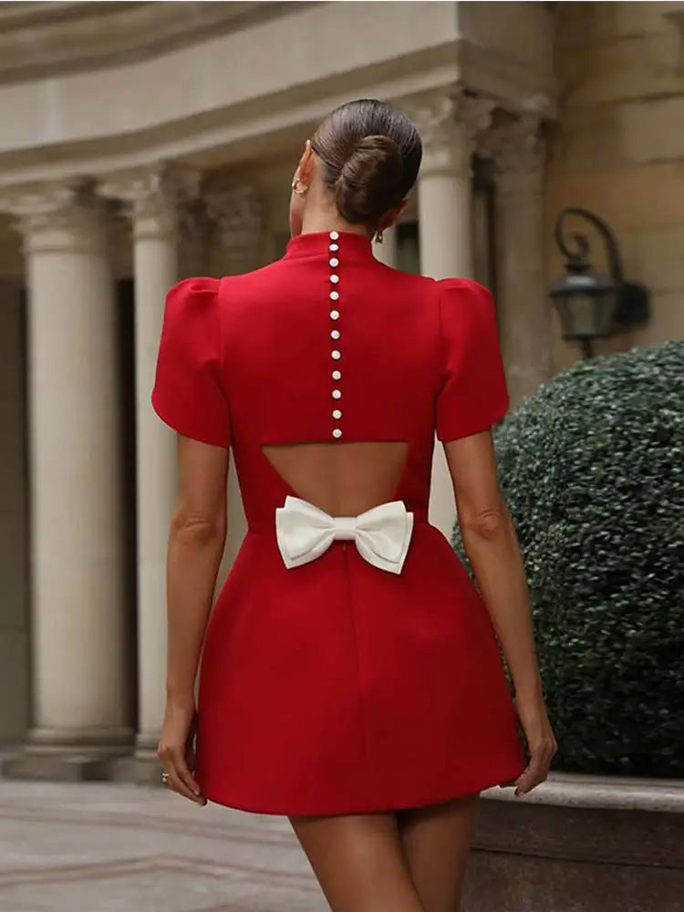 Mini dress with structured shoulders for women | Christin