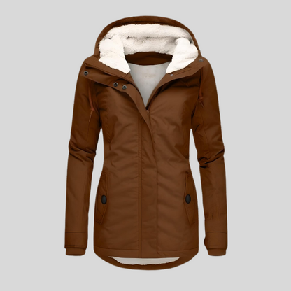 Waterproof hooded jacket with long silhouette for women | Madelyn