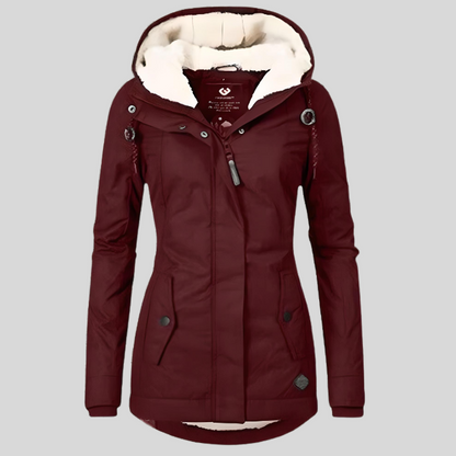 Waterproof hooded jacket with long silhouette for women | Madelyn