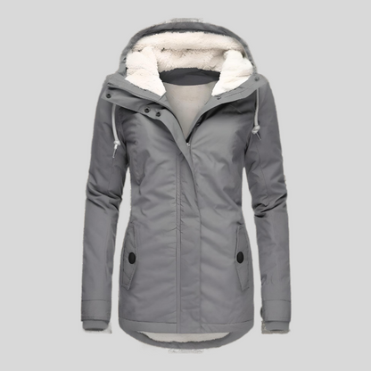 Waterproof hooded jacket with long silhouette for women | Madelyn