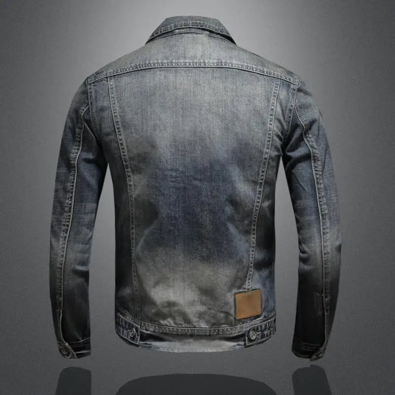 Veste en jean Clark™ posée à plat, vue sur les manches et la texture