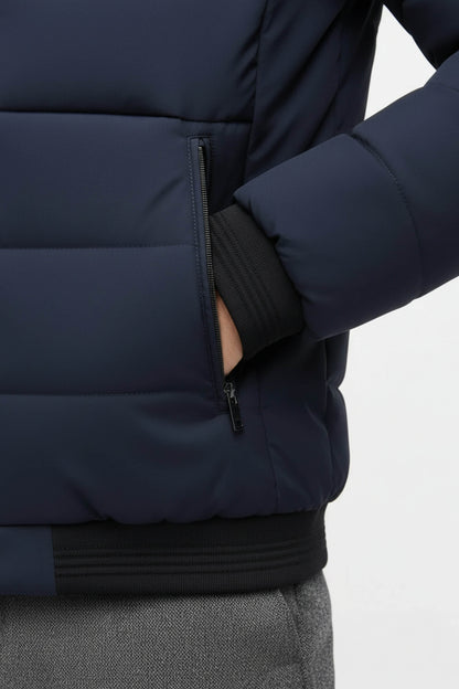 Stand-collar puffer jacket with zippered pockets for men | Caurelle