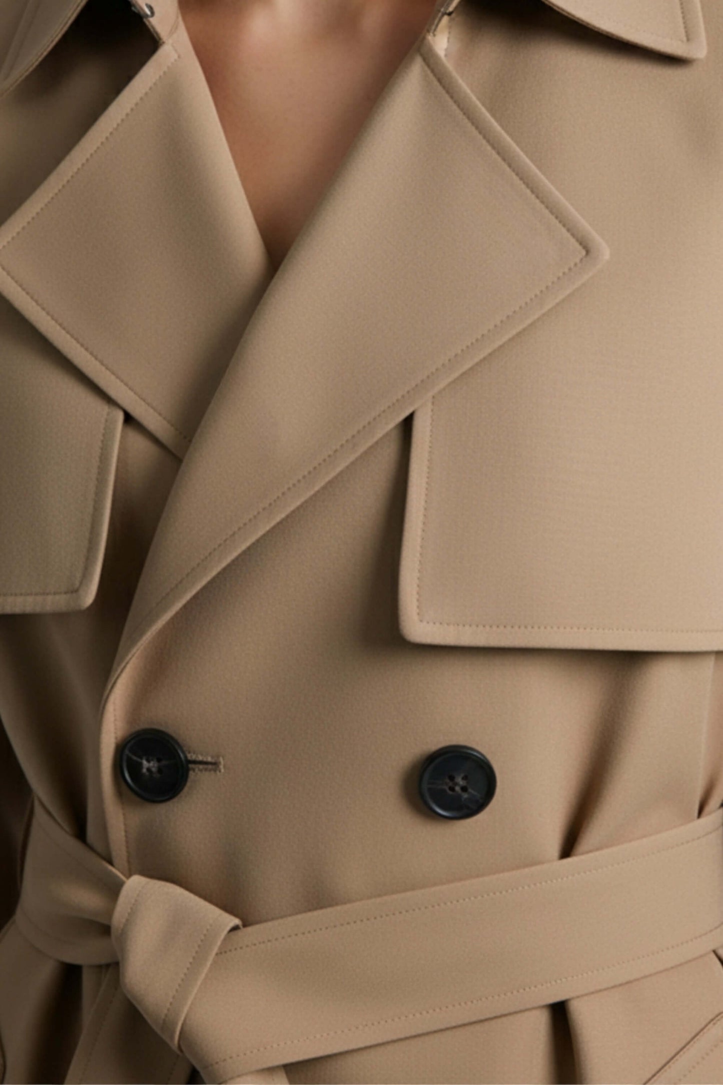 Belted long trench coat with double-button front for women | Caurelle